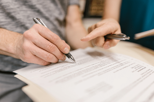 a person preparing a lease-renewal-reminder-letter