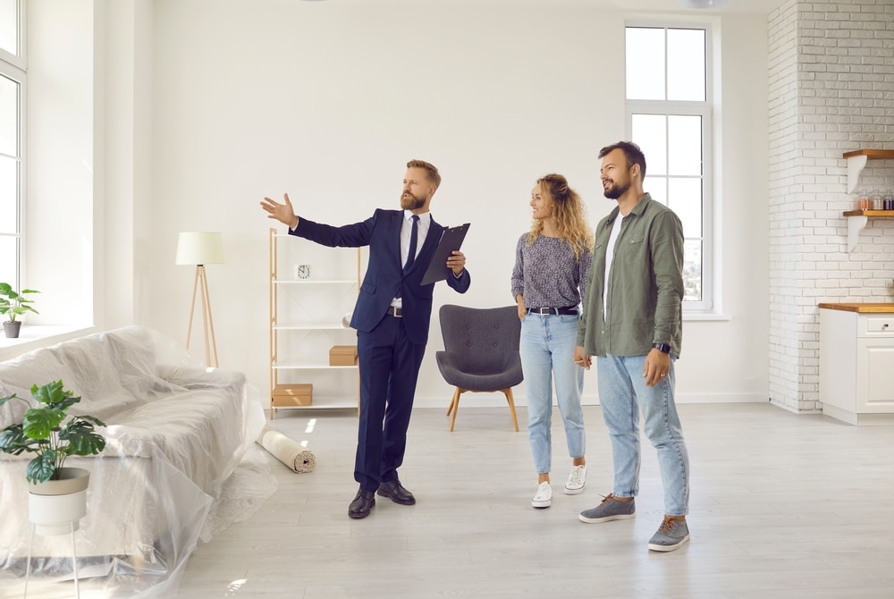 Leasing agent with two people doing an apartment tour.